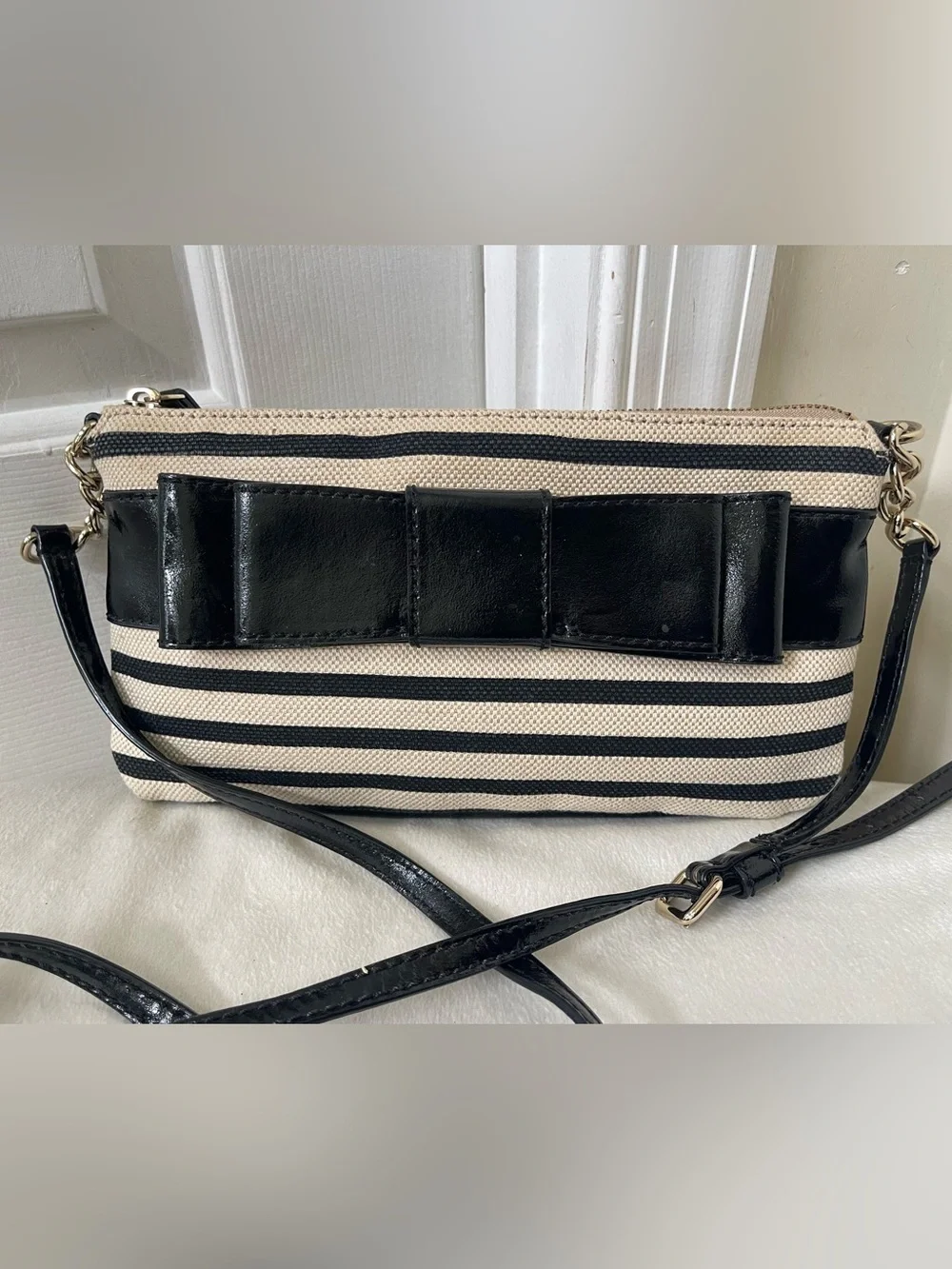 kate spade Black and Cream Striped Crossbody with Bow Detail
